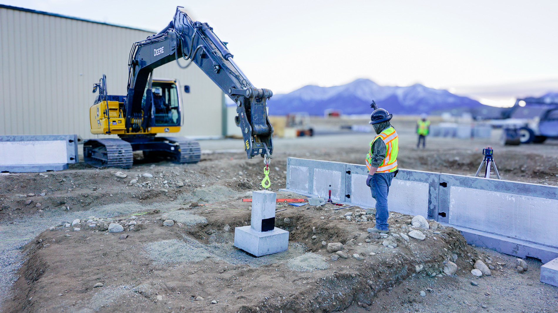 Field installation with the Fast Foundations team inside the manufacturing center for foundations, walls, footers, beams Peaks Precast LLC Buena Vista Colorado