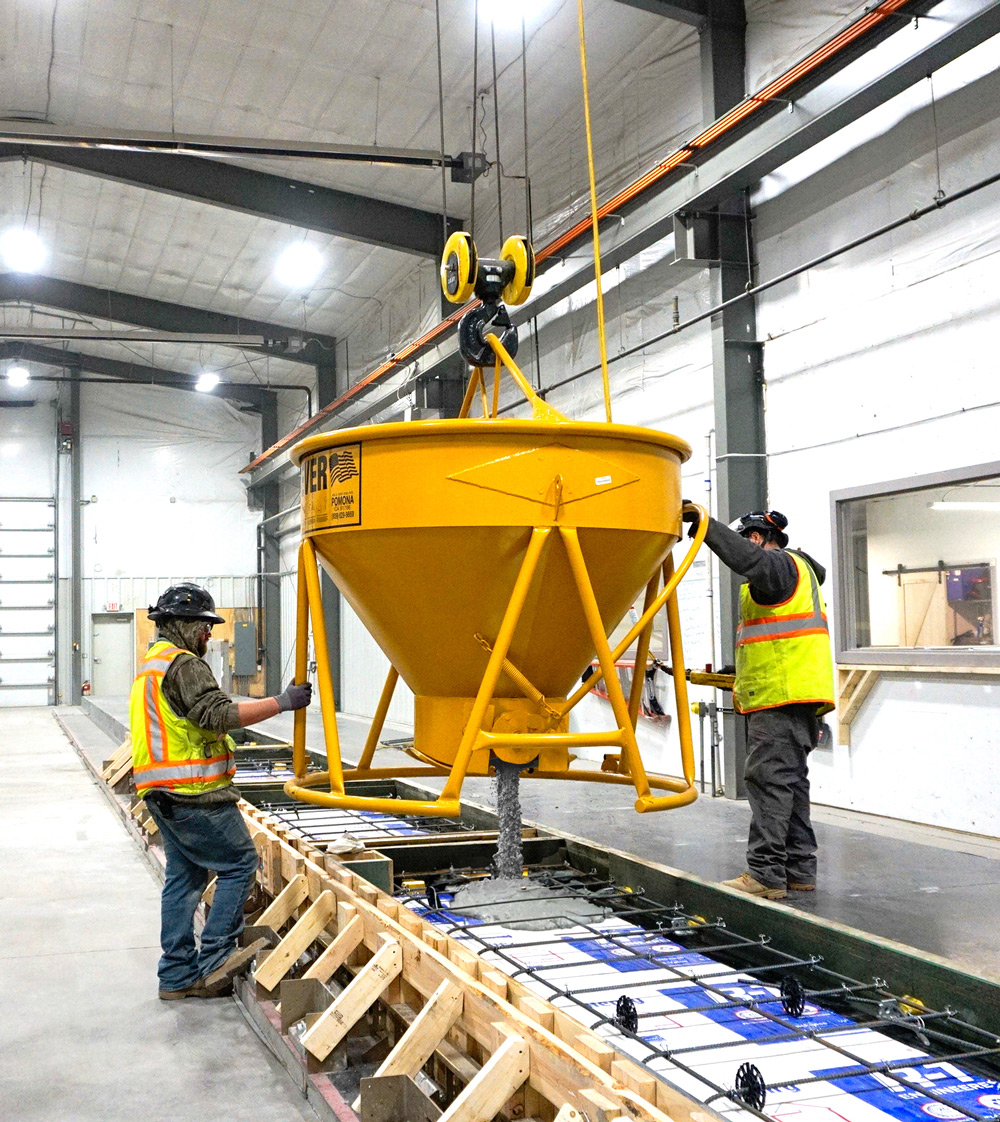 Fast Foundations team inside the manufacturing center for foundations, walls, footers, beams Peaks Precast LLC Buena Vista Colorado