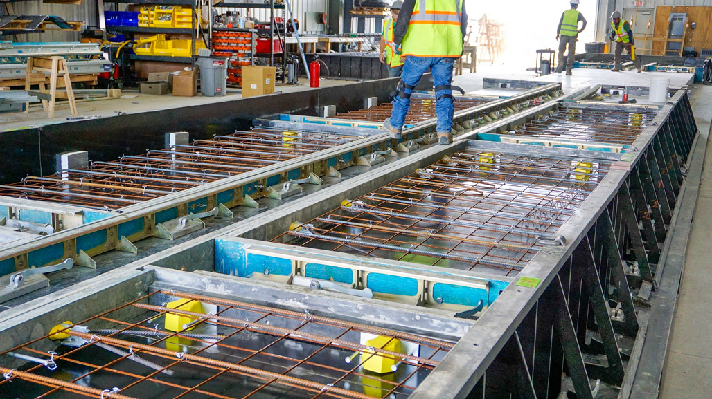 rebar is set up inside the Fast Foundations precast concrete manufacturing facility Buena Vista Colorado